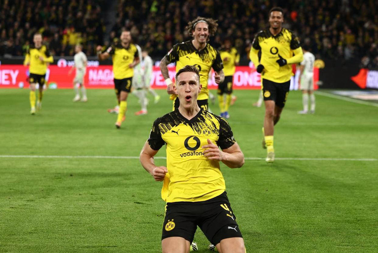 德甲最新积分榜与射手榜解析：法兰克福惜败，多特蒙德强势登顶第二